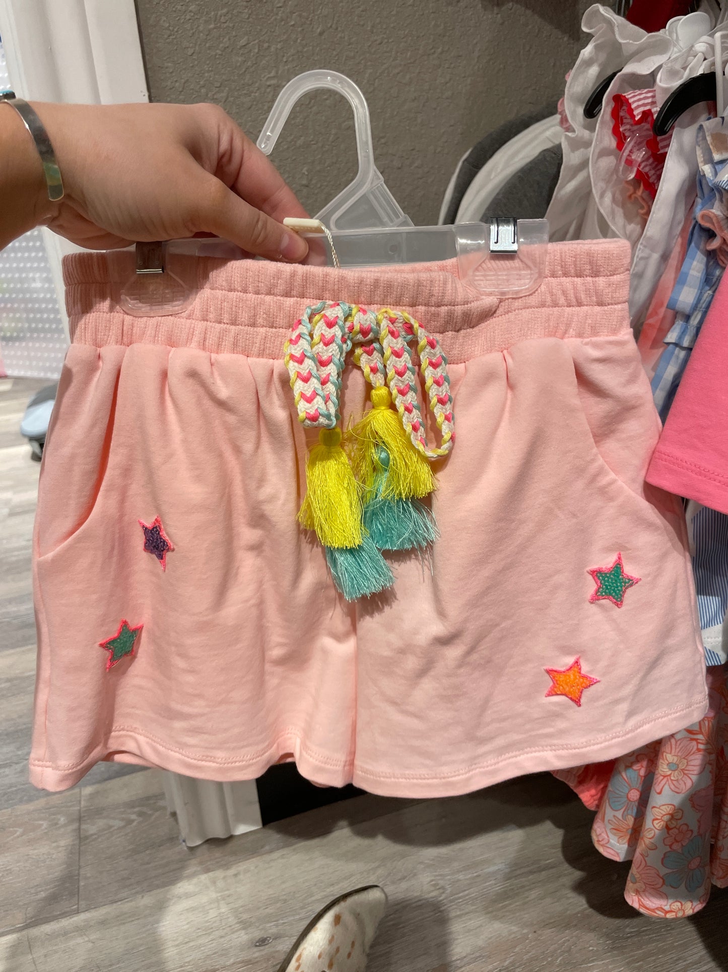 SHORTS WITH STAR PATCHES AND TASSEL TIE