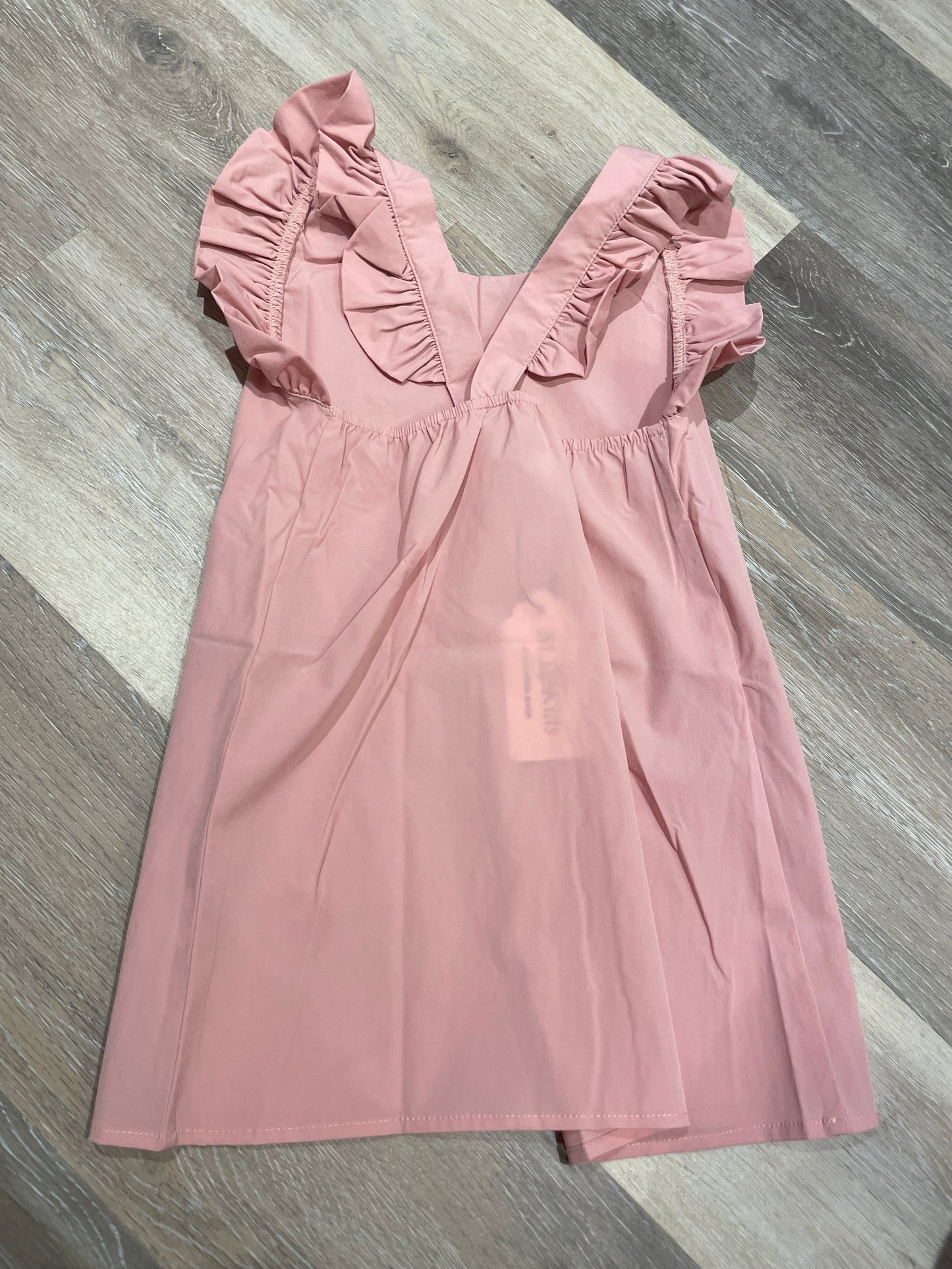 BLUSH CROSSED BACK RUFFLE TANK