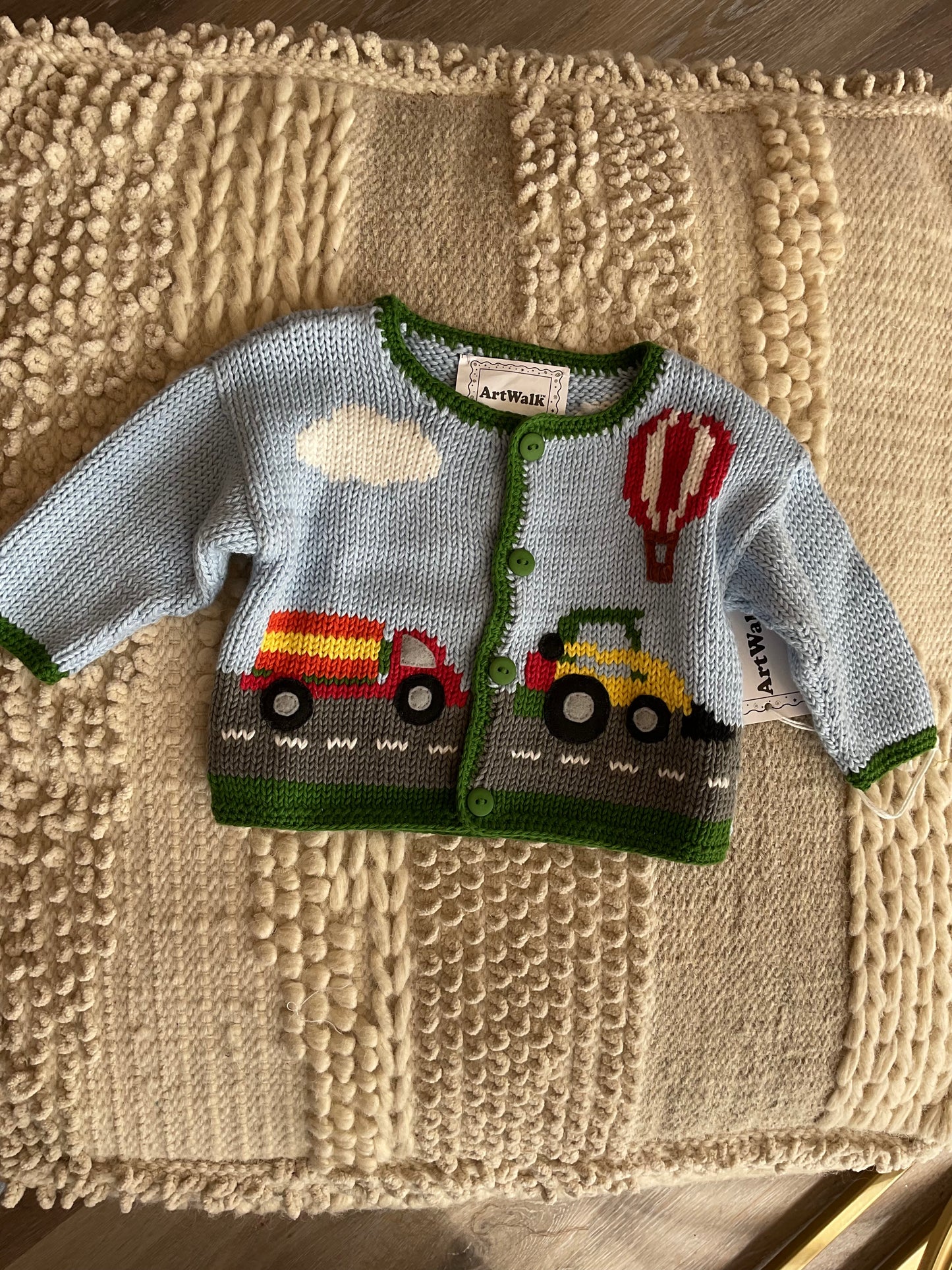 KNIT ALL ABOARD BUTTON SWEATER