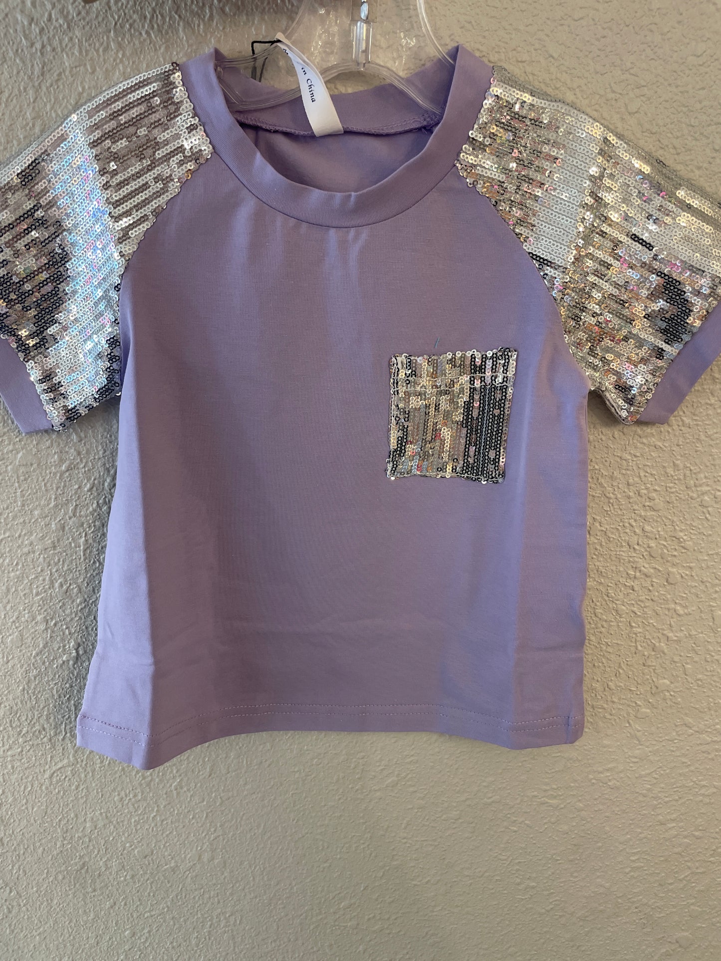 LAVENDER TOP W/ SEQUIN SLEEVE AND POCKET